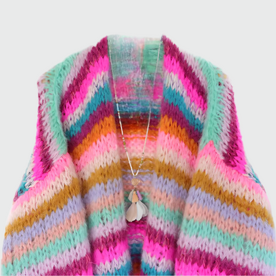 Winter sweater made of rope in a colorful pattern with wooden buttons for women