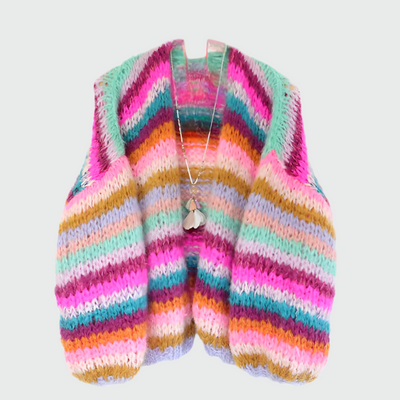Winter sweater made of rope in a colorful pattern with wooden buttons for women
