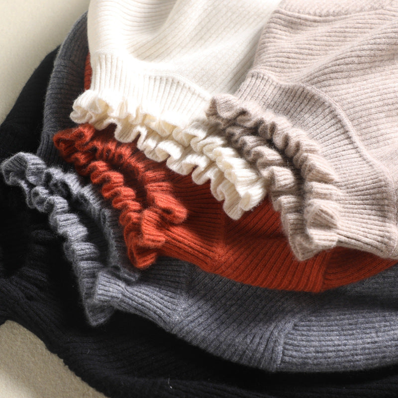 Kashmir sweater with elegant twirl design for stylish women