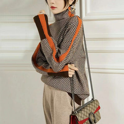Rolling collar sweater with a geometric knitting pattern