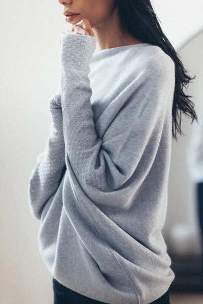 Sweater with asymmetrical draping and loose cut for women