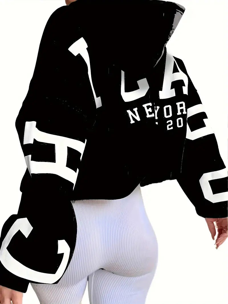 Sweater in oversized long-sleeved design with text logo on the sleeve for women