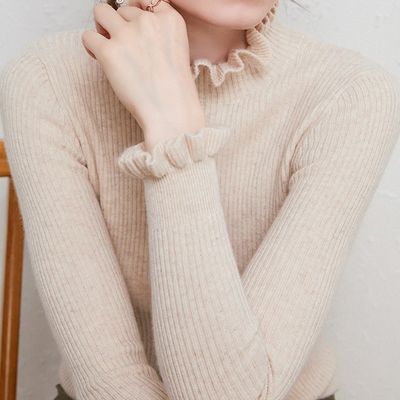 Kashmir sweater with elegant twirl design for stylish women