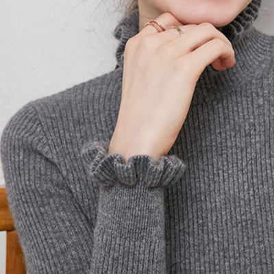 Kashmir sweater with elegant twirl design for stylish women