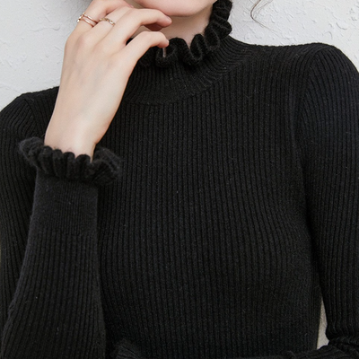 Kashmir sweater with elegant twirl design for stylish women