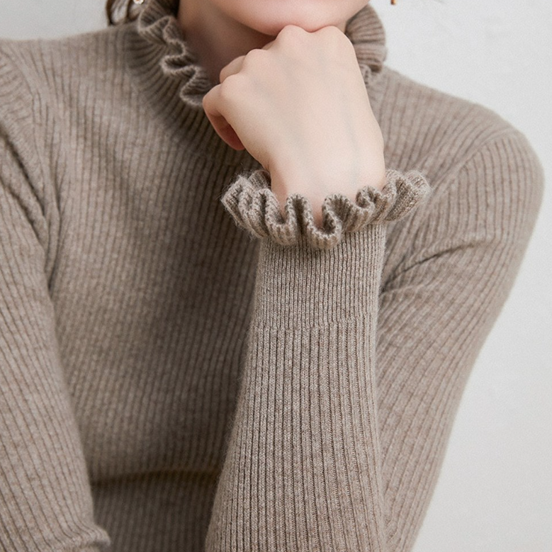 Kashmir sweater with elegant twirl design for stylish women