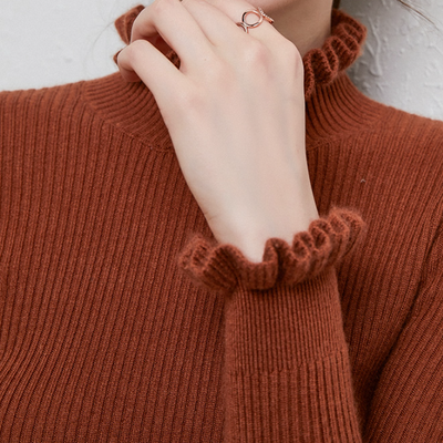 Kashmir sweater with elegant twirl design for stylish women