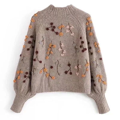 Knitting sweaters with perlendails in brown for women - elegance and warmth