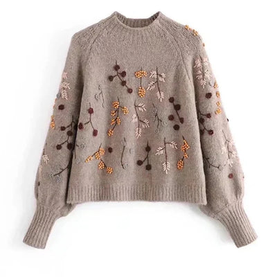 Knitting sweaters with perlendails in brown for women - elegance and warmth