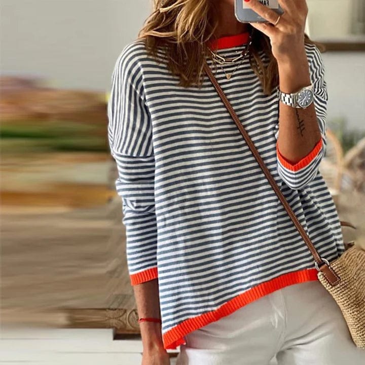 Sweaters in blue with orange -colored edge and striped pattern