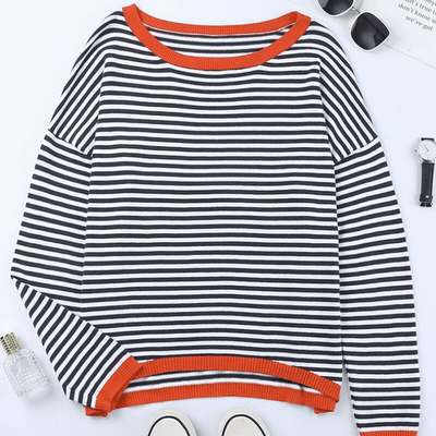 Sweaters in blue with orange -colored edge and striped pattern